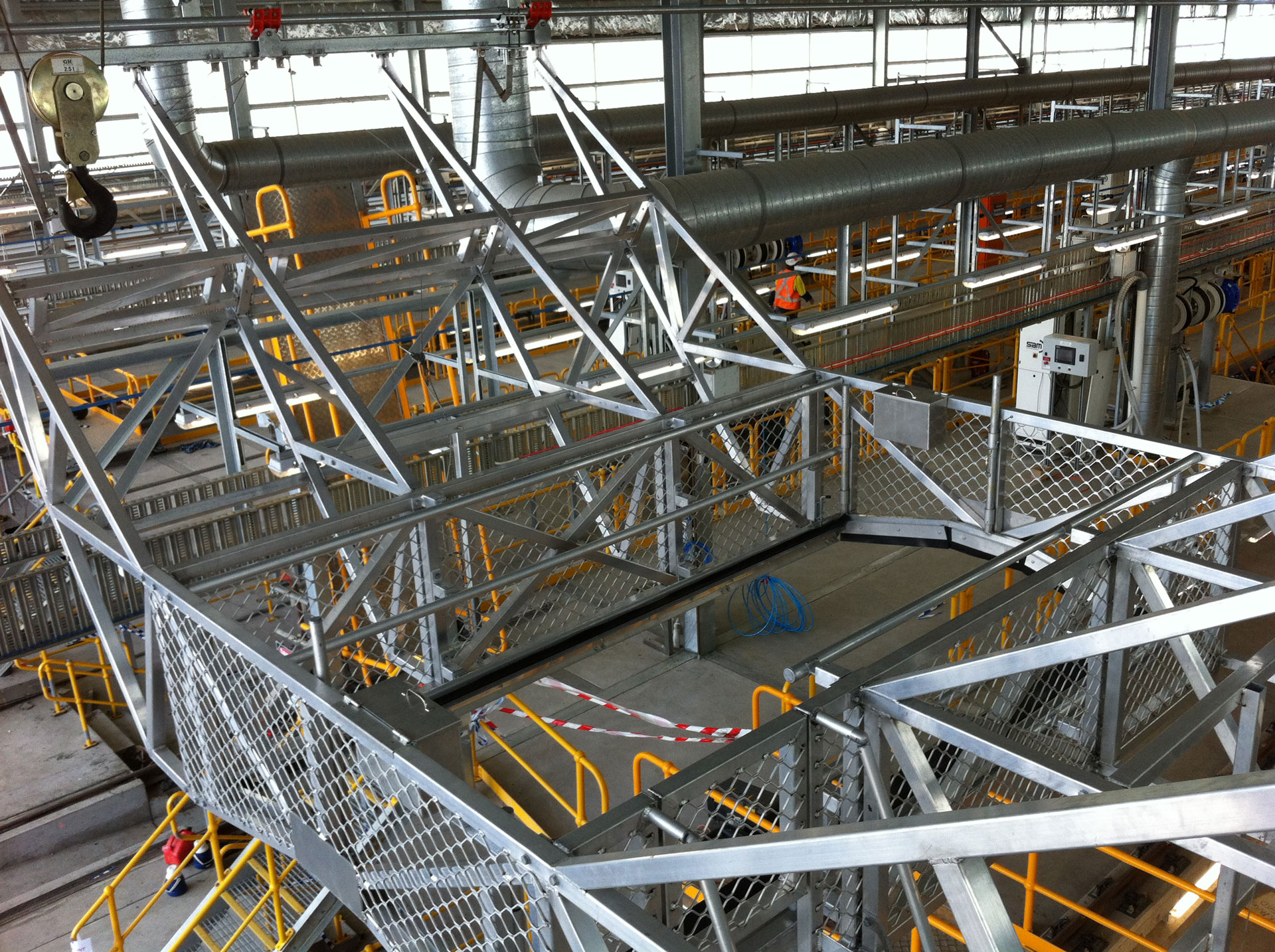Engineers carrying out fabrication and installation services for an industrial engineering project